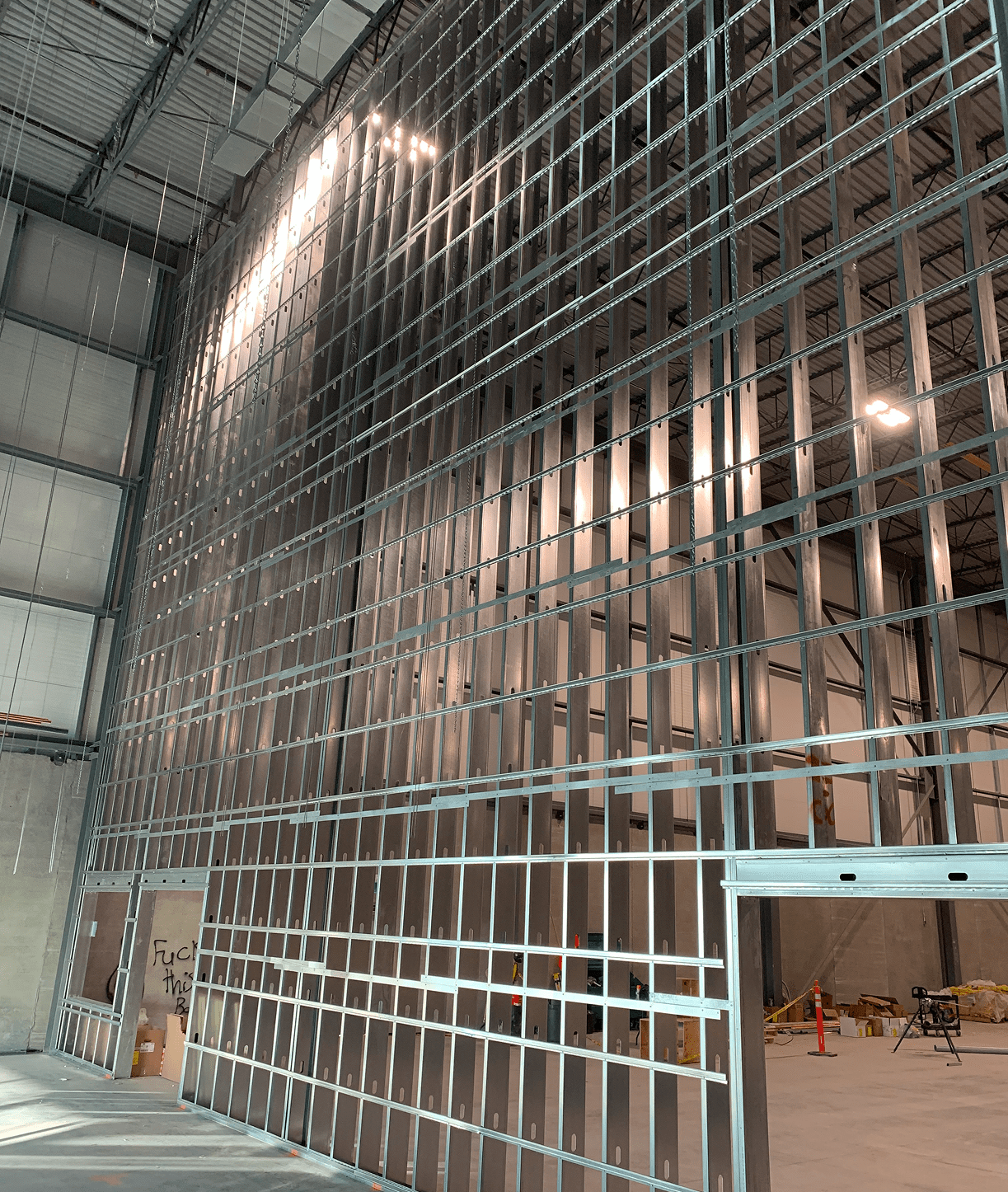 Tall industrial metal framework under construction.