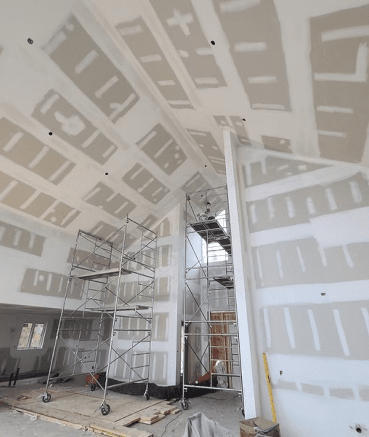 Scaffolding inside a partially constructed building.