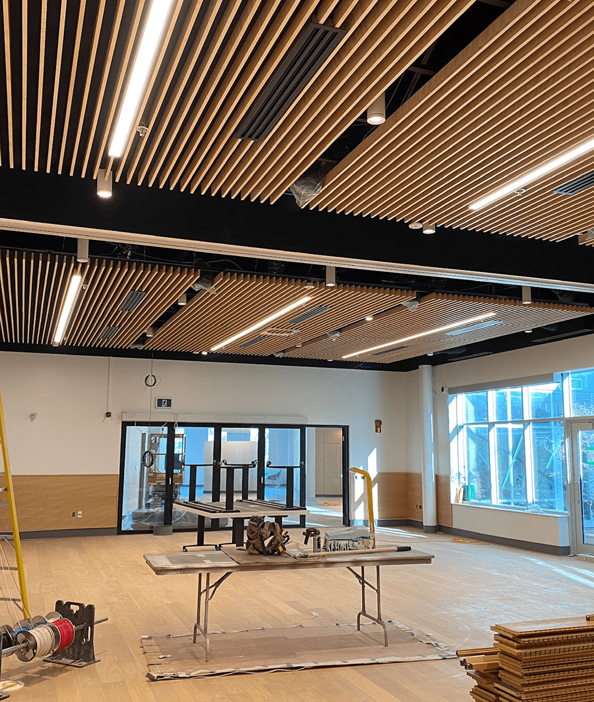 Modern interior with wood ceiling installation.