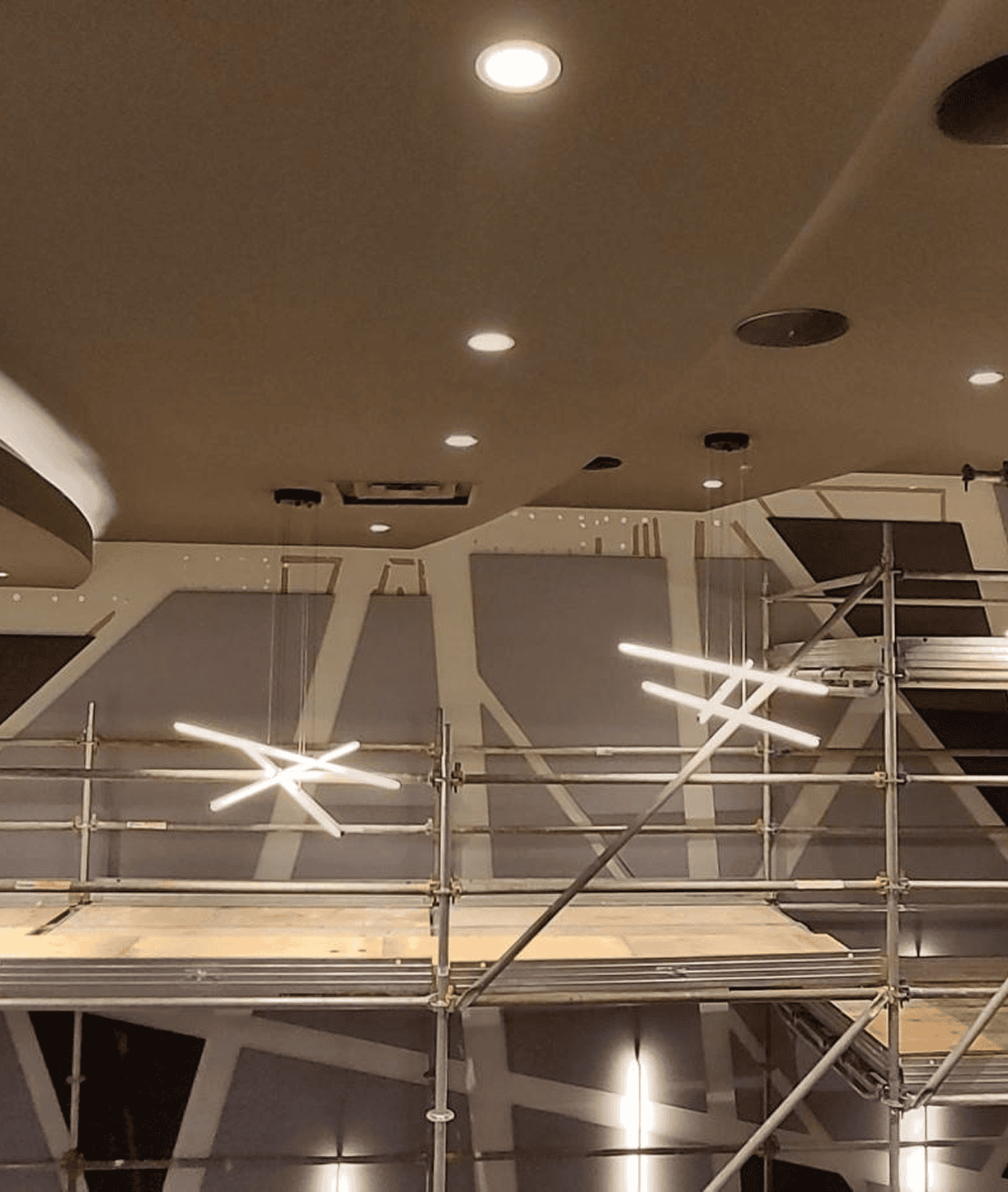 Interior scaffolding under modern LED star lights